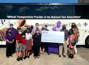 Louisiana Motor Coach team presents check to the Cystic Fibrosis Foundation