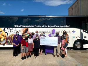 Louisiana Motor Coach team presents check to the Cystic Fibrosis Foundation