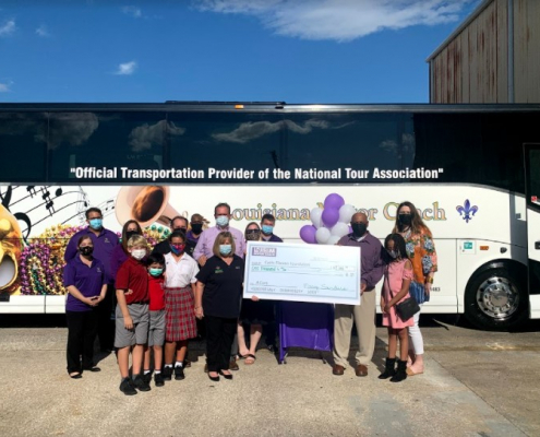 Louisiana Motor Coach team presents check to the Cystic Fibrosis Foundation