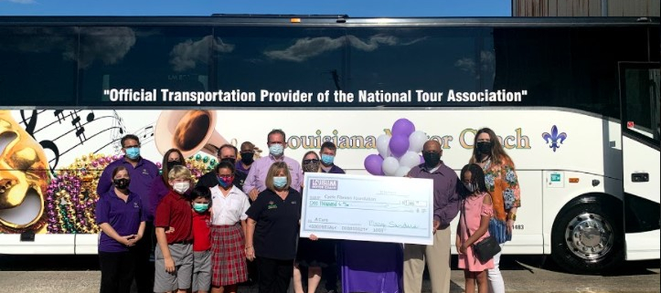 Louisiana Motor Coach team presents check to the Cystic Fibrosis Foundation