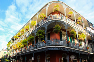 A corner building with wrap around balconies in New Orleans, Louisiana