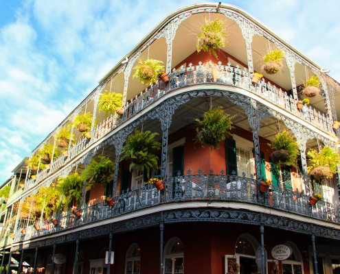 A corner building with wrap around balconies in New Orleans, Louisiana