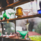 antiques on a shelf at an antique shop